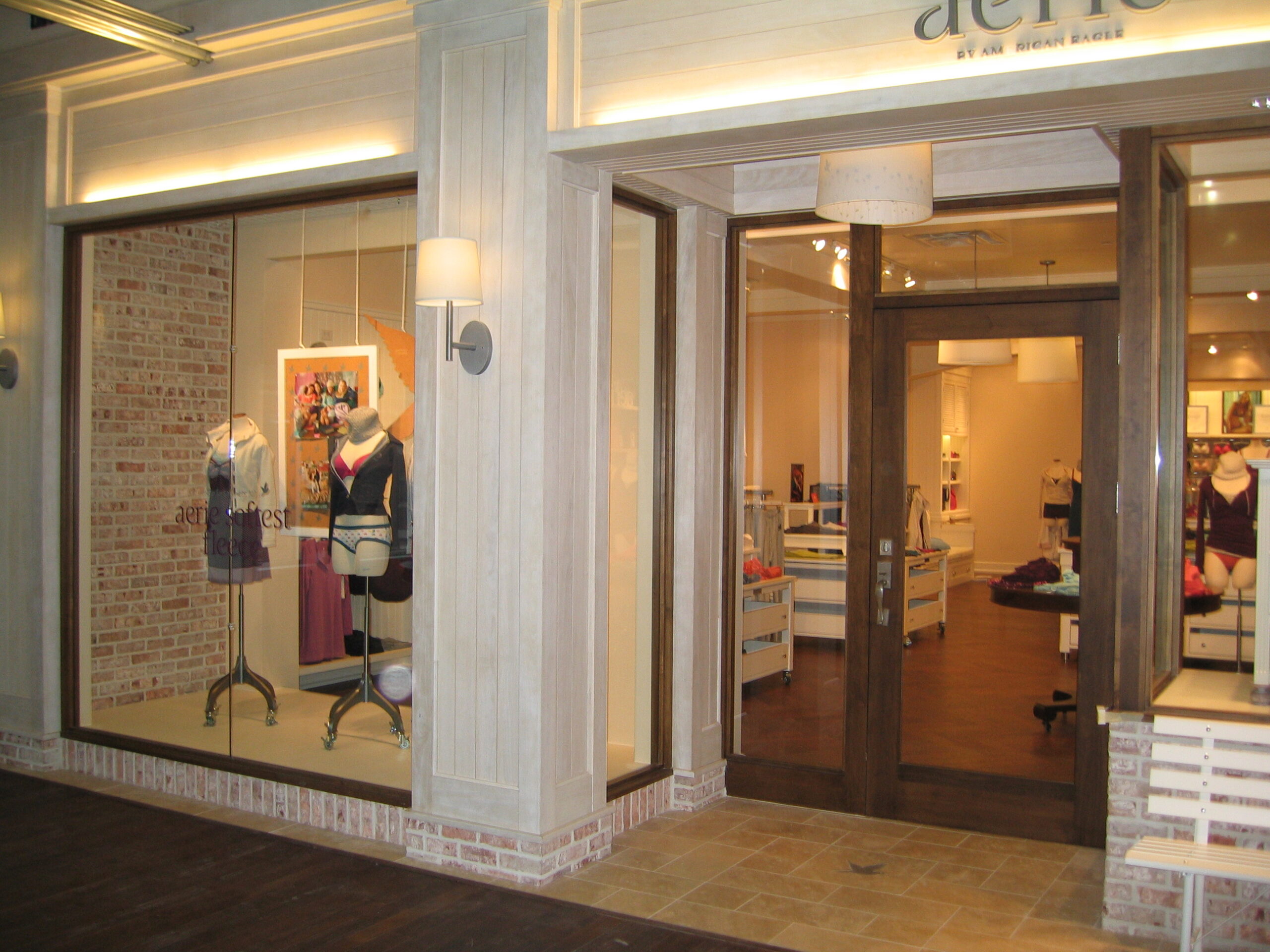 Storefront wall display millwork with integrated shelving (portfolio image 18)