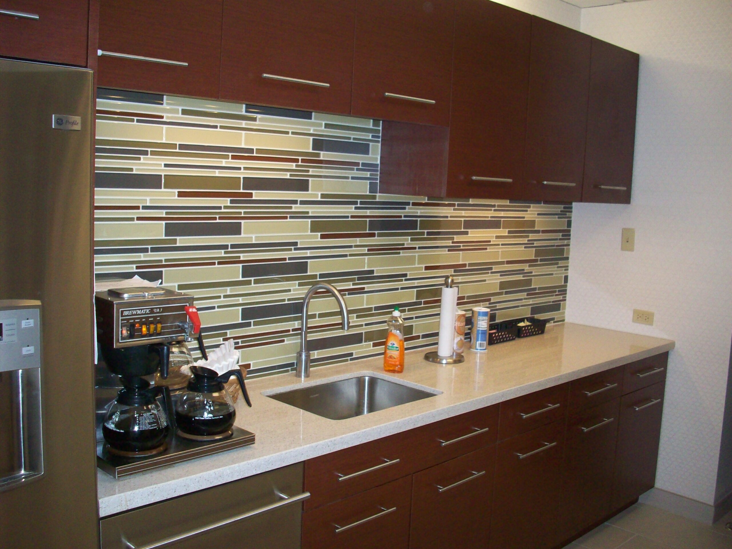 Laminate breakroom casework with solid surface counters (portfolio image 23)