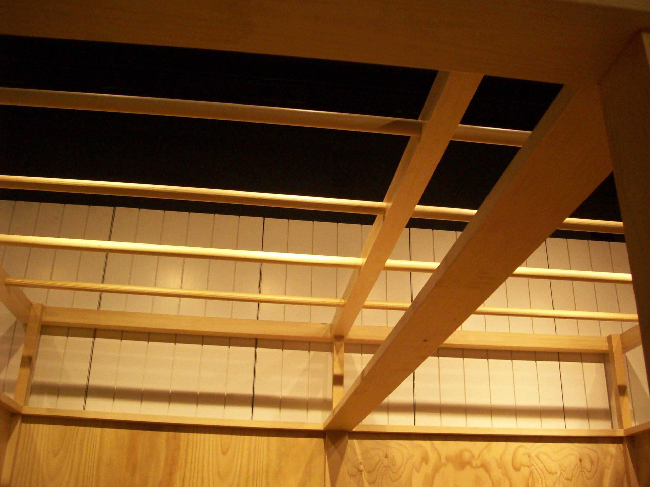 Worship platform millwork with concealed storage and trim details (portfolio image 6)