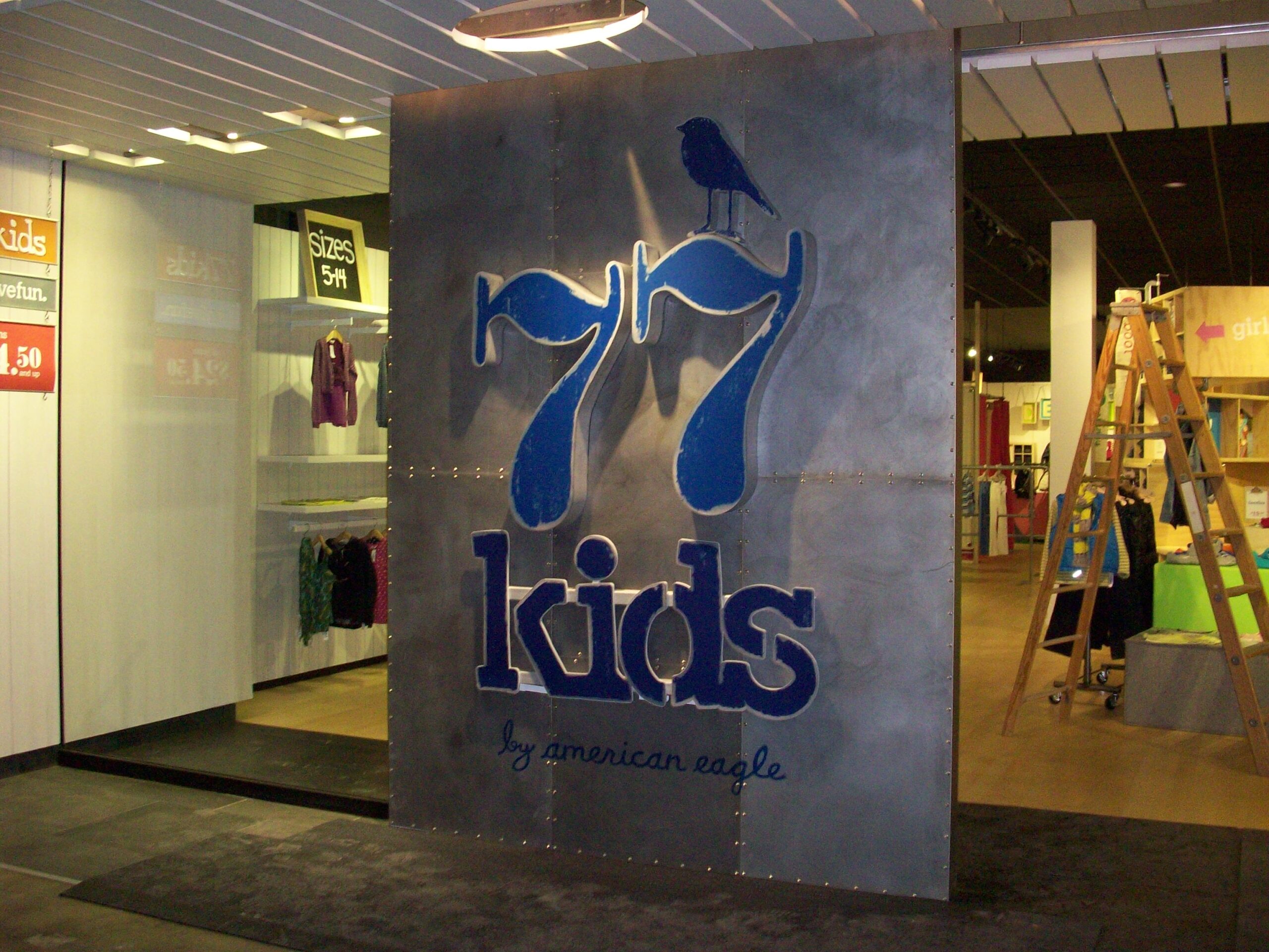 Retail fixture package with display islands and back-of-house storage (portfolio image 24)