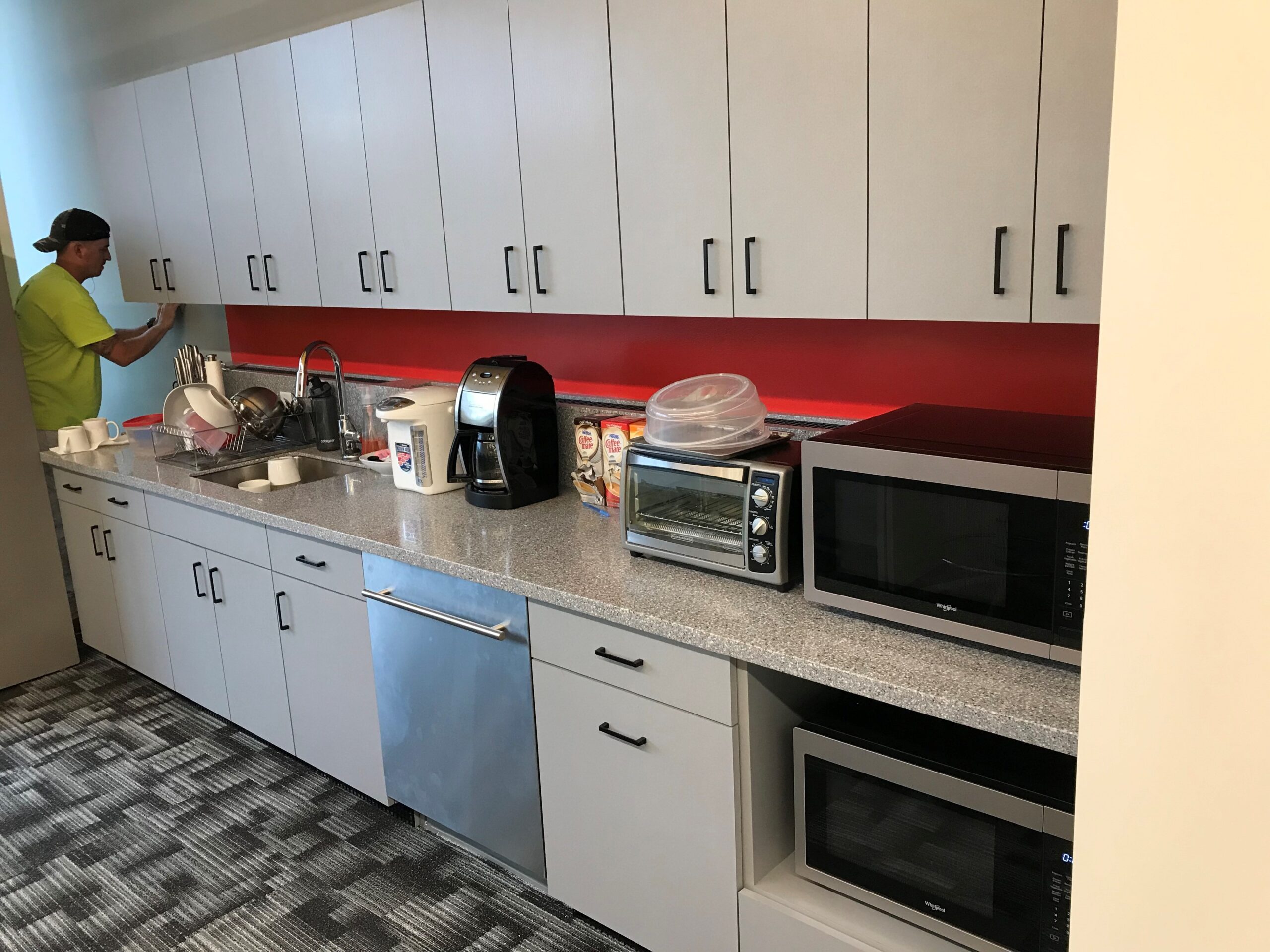 Laminate breakroom casework with solid surface counters (portfolio image 13)