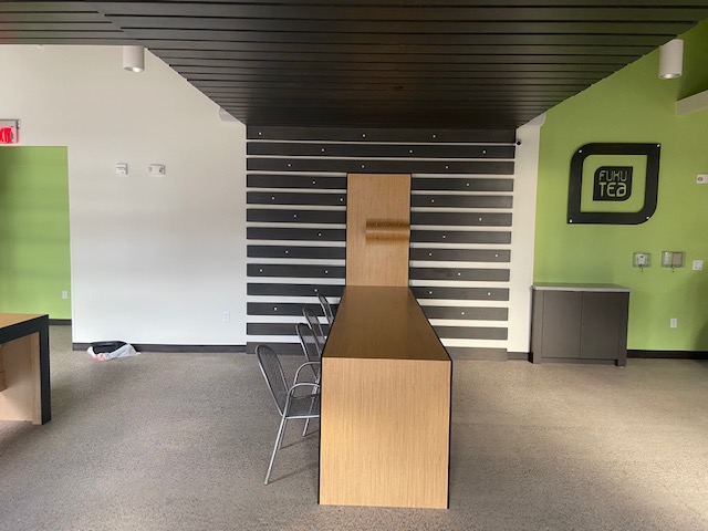 Cafe service counter with solid surface top and laminate casework (portfolio image 7)