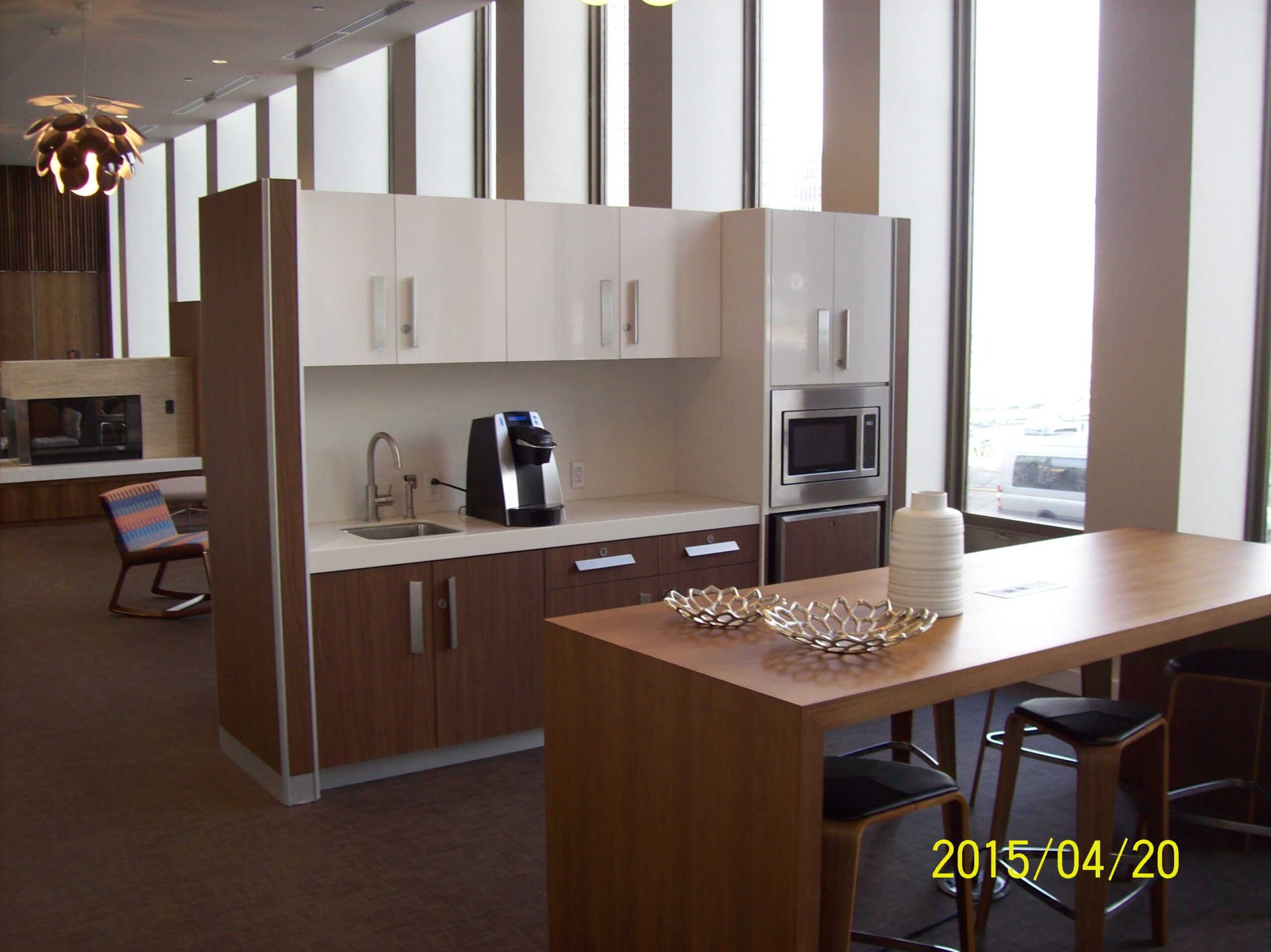 Hotel lobby millwork with custom front desk and feature panels (portfolio image 13)